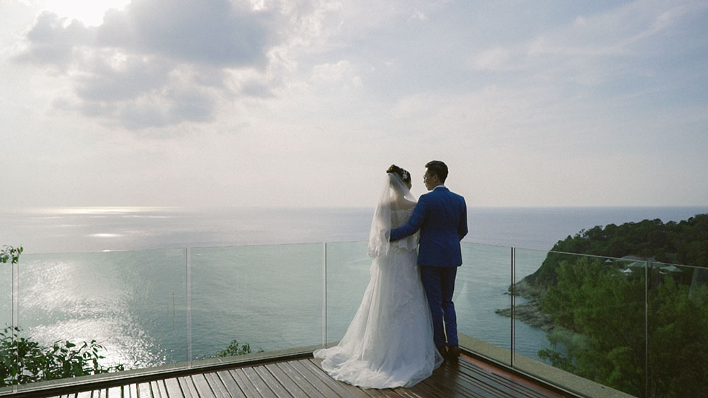 couple shot wedding videographer phuket paresa